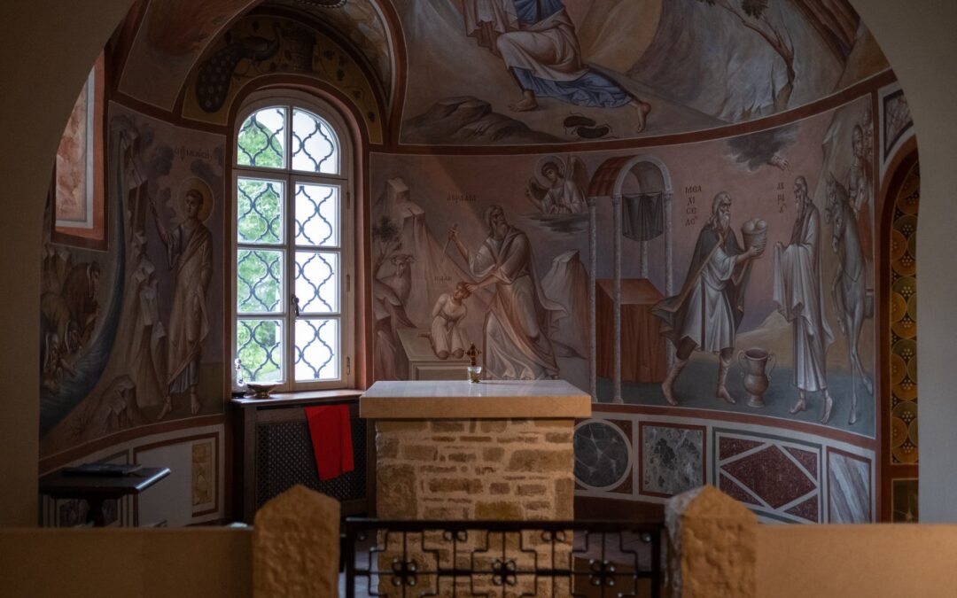 concrete table beside glass window