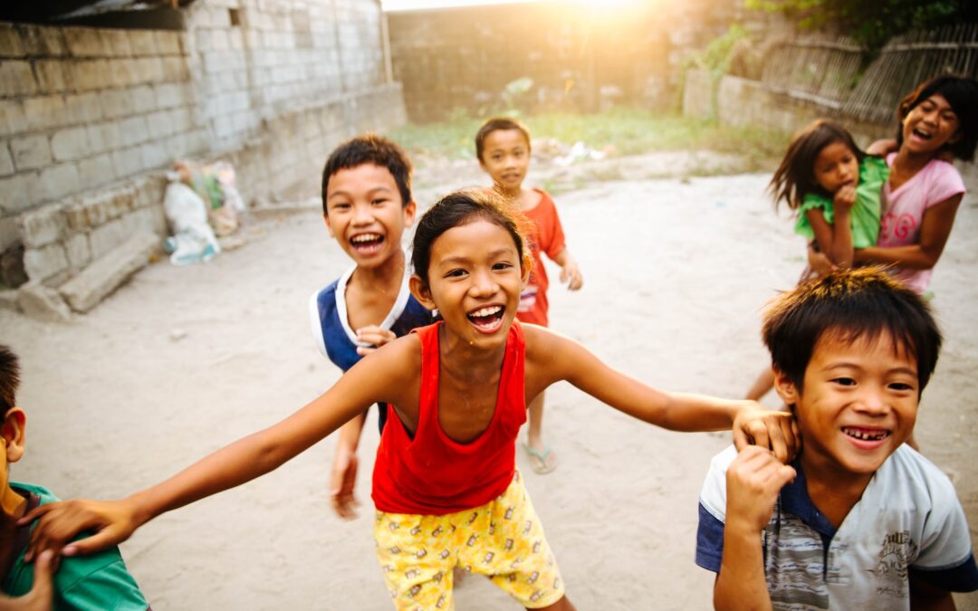 group of children laughing together